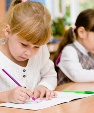 two-girls-in-school-at-table