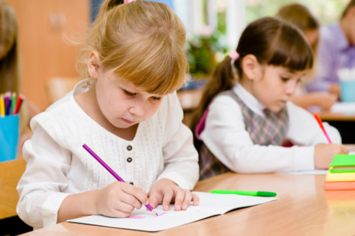 two-girls-in-school-at-table